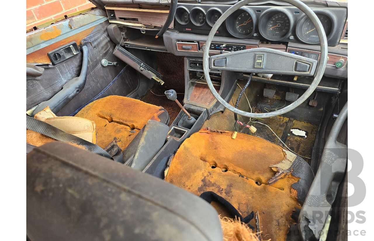 Circa 1974 Datsun 180b SSS KP610 2d Hardtop Orange 1.8L