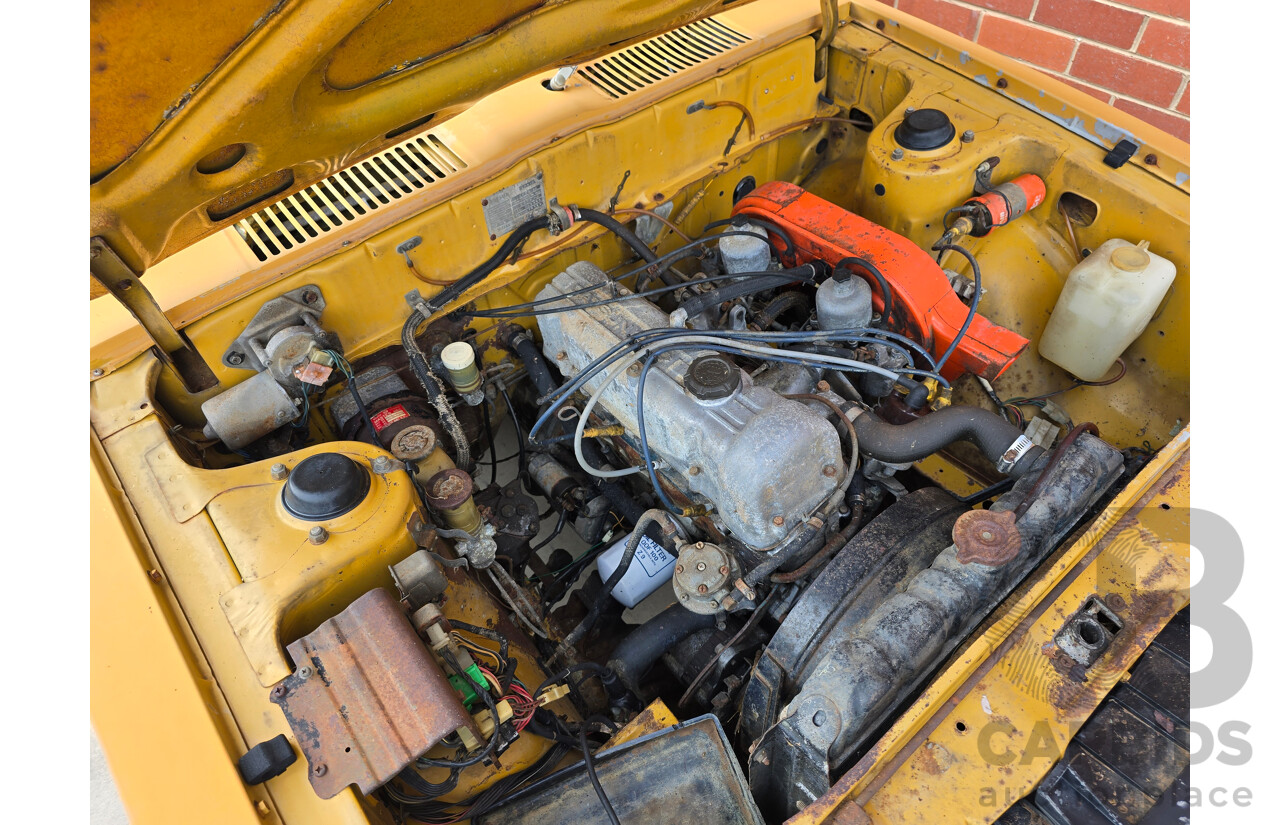 Circa 1974 Datsun 180b SSS KP610 2d Hardtop Orange 1.8L