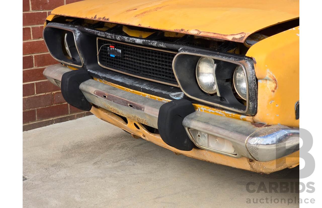 Circa 1974 Datsun 180b SSS KP610 2d Hardtop Orange 1.8L
