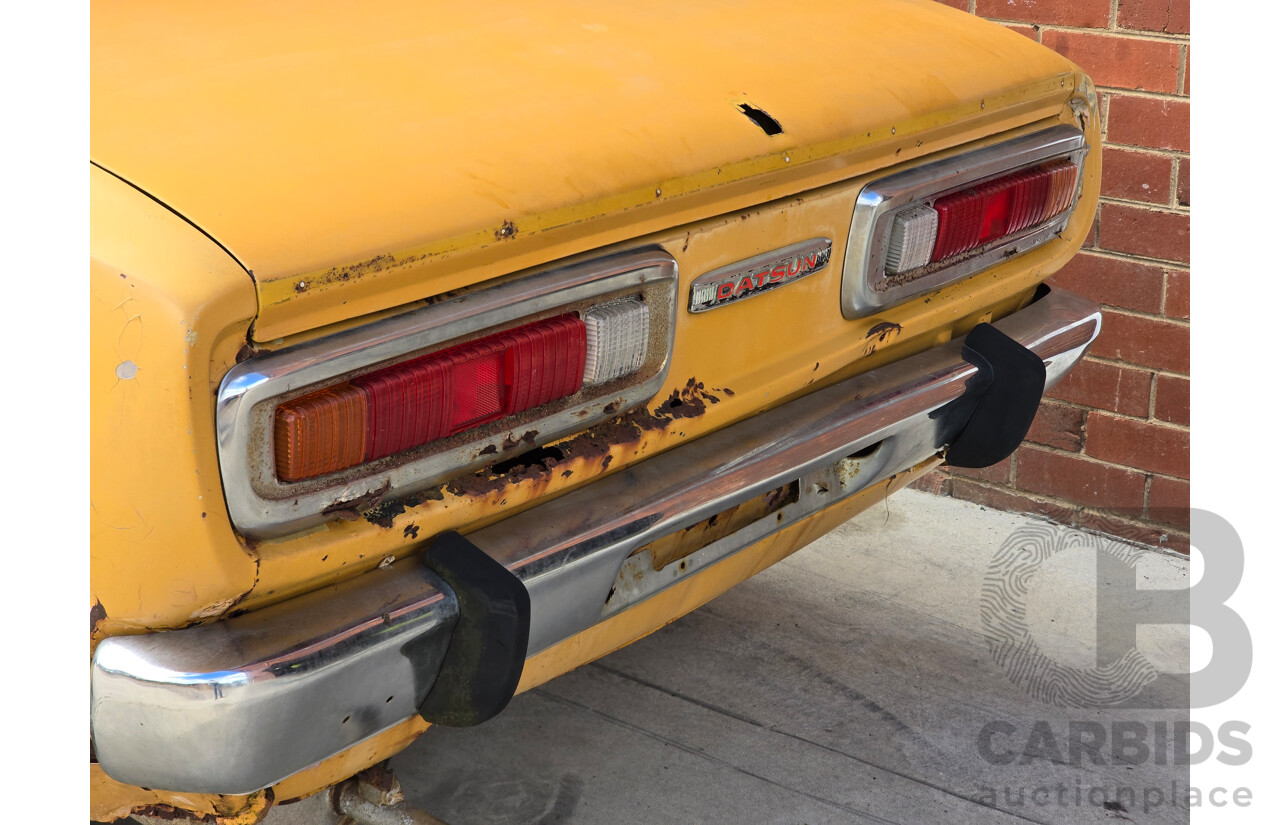 Circa 1974 Datsun 180b SSS KP610 2d Hardtop Orange 1.8L