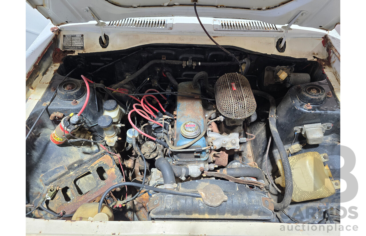 7/1970 Datsun 1200 Standard B110 4d Sedan White 1.2L