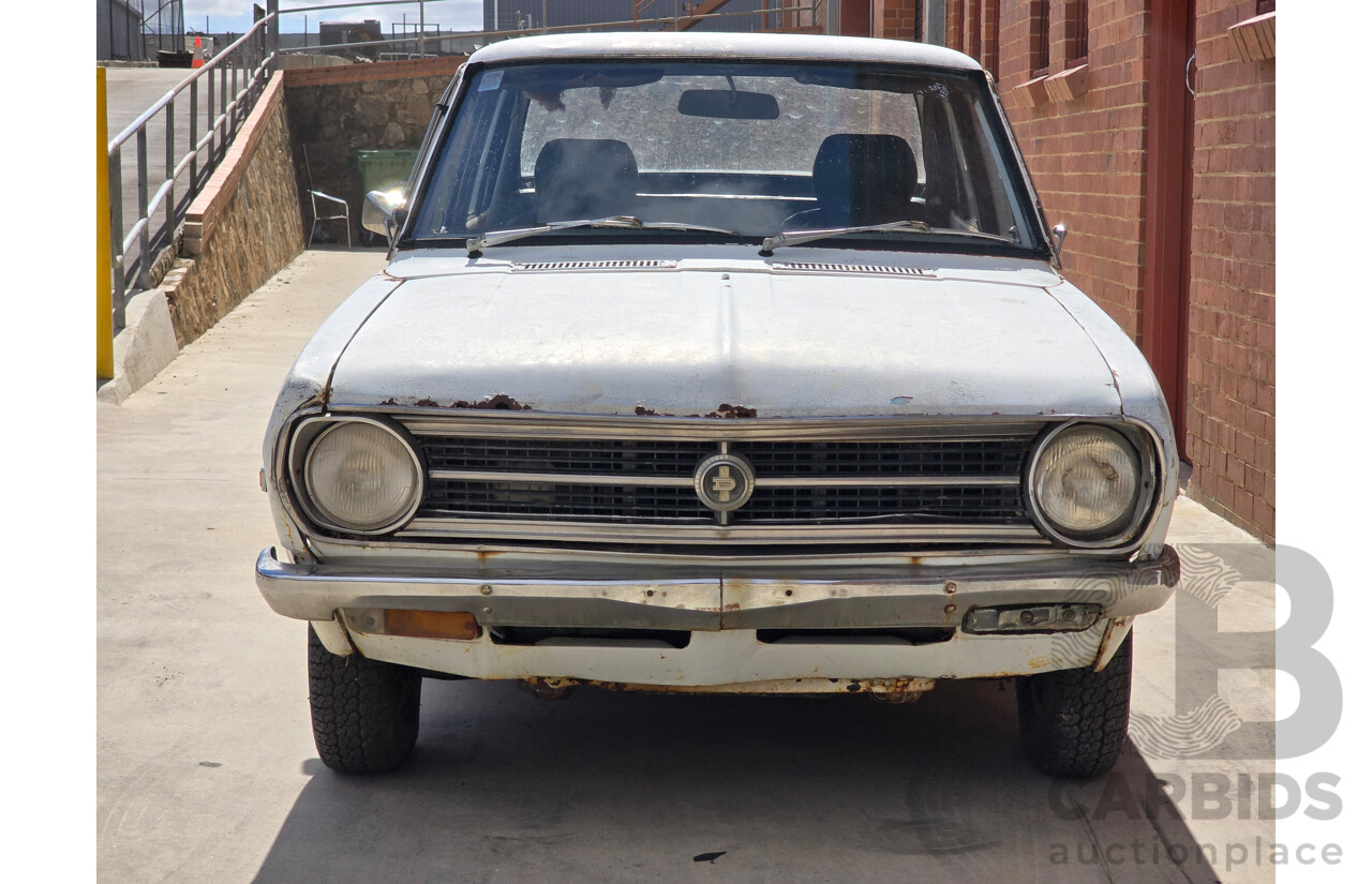 7/1970 Datsun 1200 Standard B110 4d Sedan White 1.2L