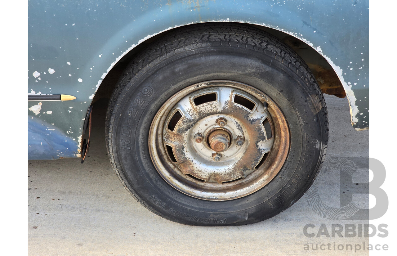 1/1975 Datsun 240k GL HGC110 4d Sedan Blue 2.4L