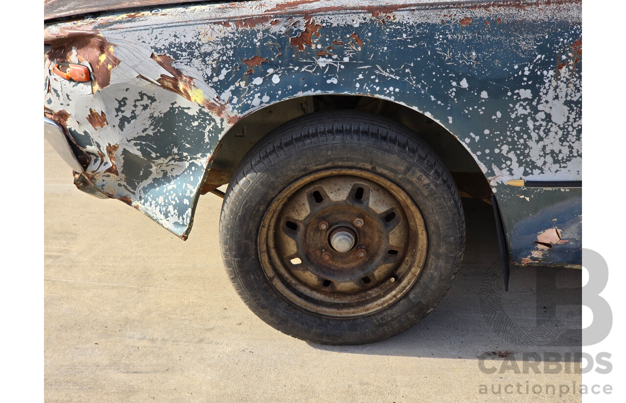 1/1975 Datsun 240k GL HGC110 4d Sedan Blue 2.4L