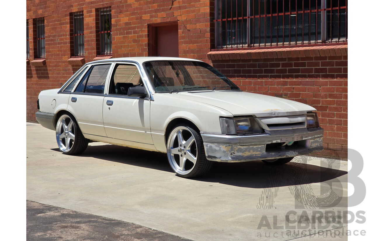 7/1984 Holden VK Commodore SL 4d Sedan Alpine White 3.3L