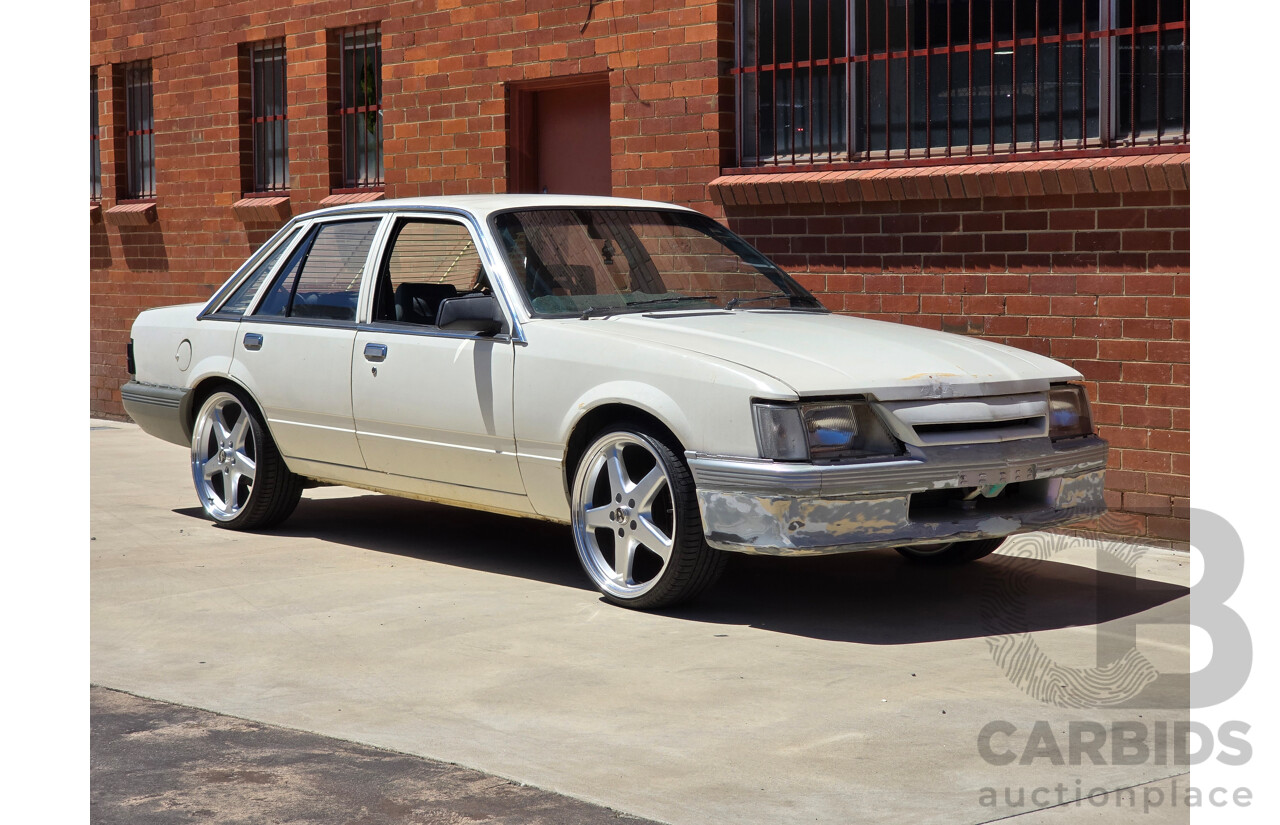 7/1984 Holden VK Commodore SL 4d Sedan Alpine White 3.3L