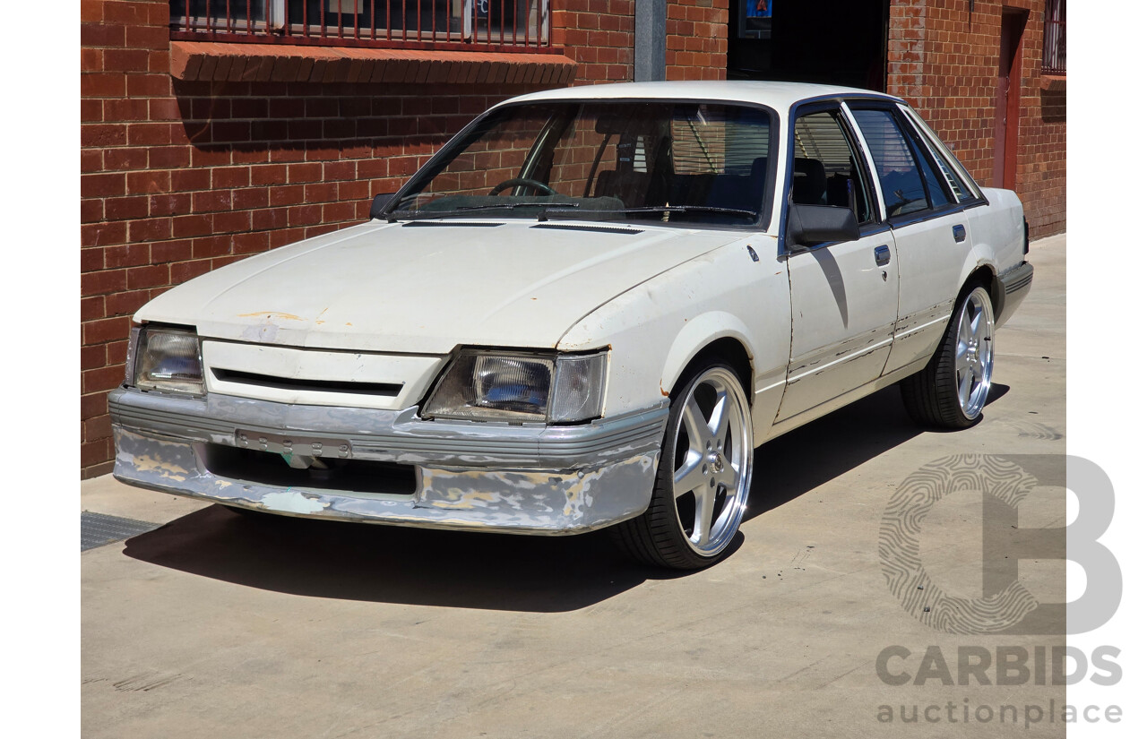 7/1984 Holden VK Commodore SL 4d Sedan Alpine White 3.3L