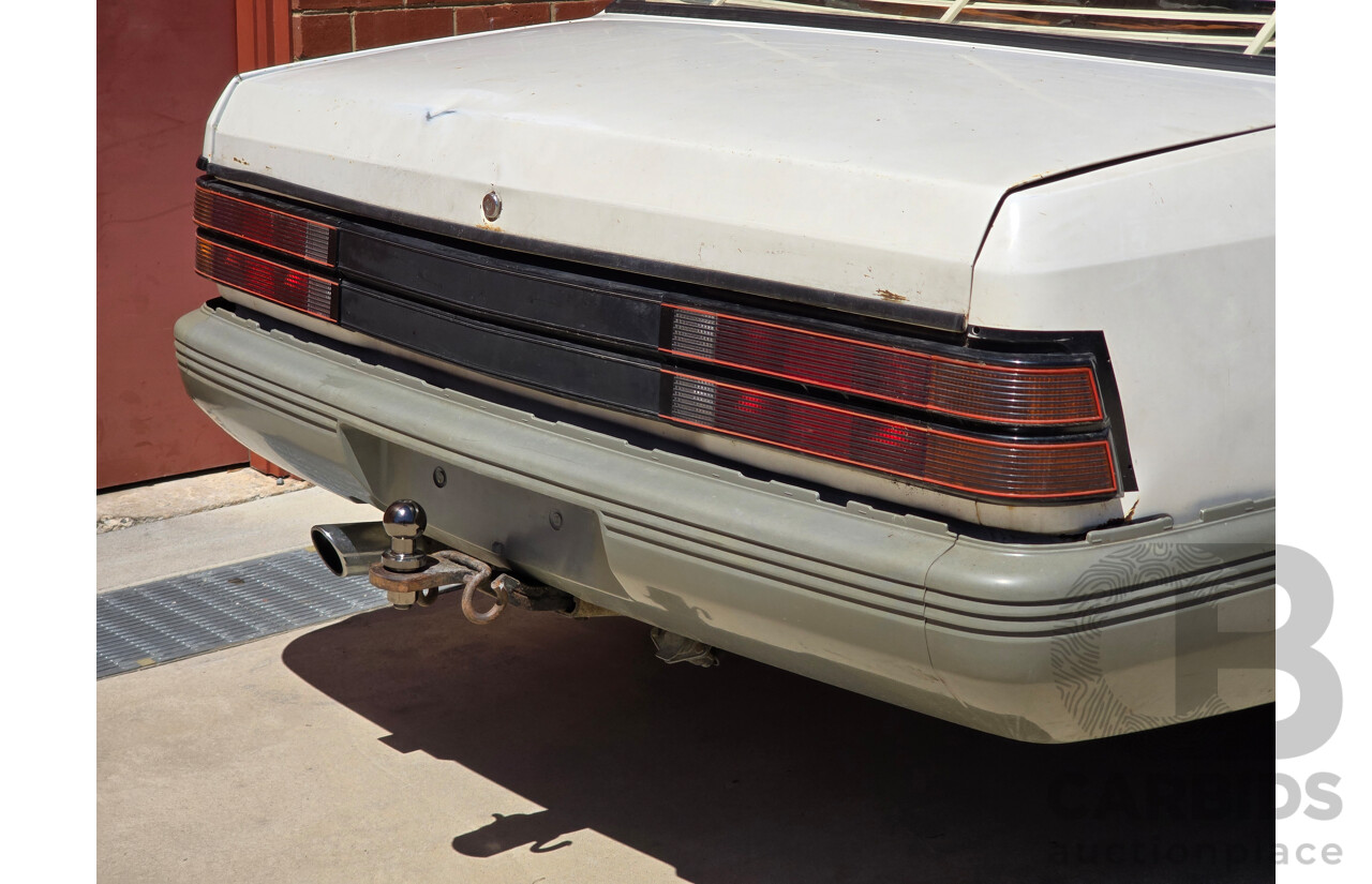 7/1984 Holden VK Commodore SL 4d Sedan Alpine White 3.3L