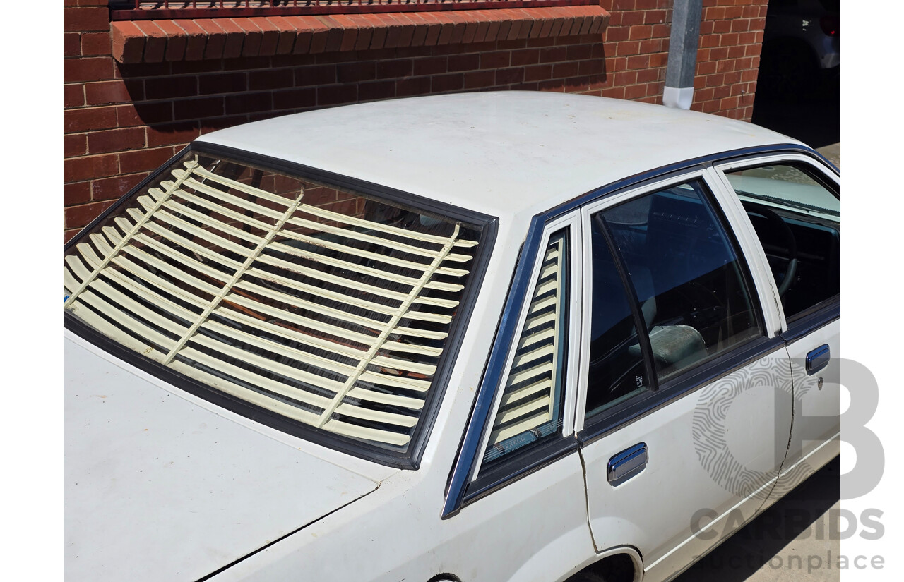 7/1984 Holden VK Commodore SL 4d Sedan Alpine White 3.3L