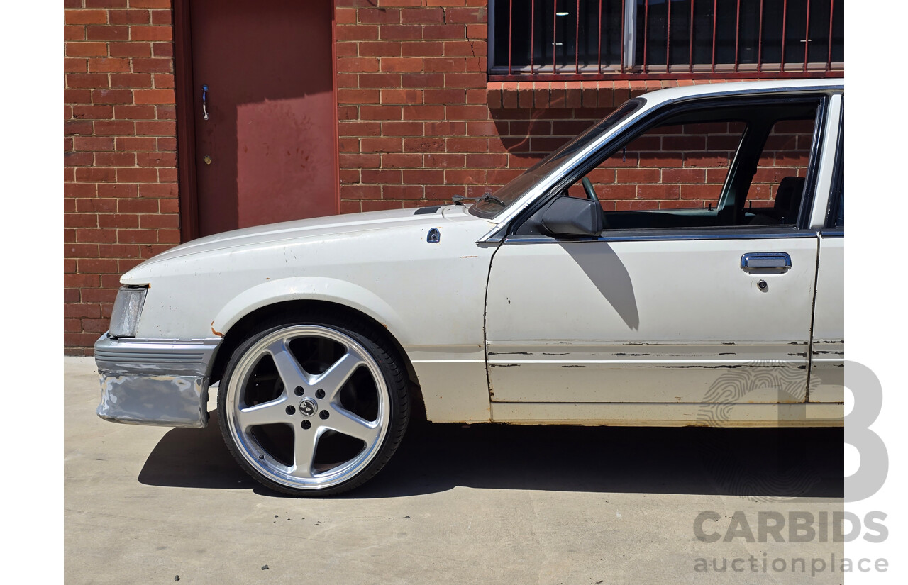7/1984 Holden VK Commodore SL 4d Sedan Alpine White 3.3L