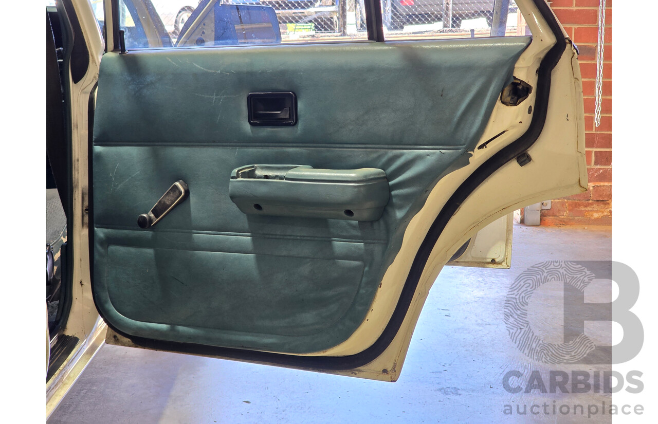 7/1984 Holden VK Commodore SL 4d Sedan Alpine White 3.3L