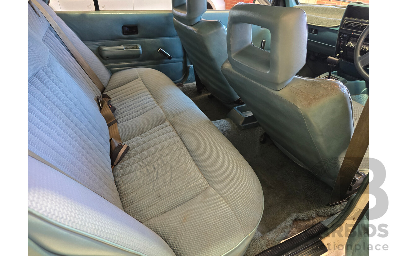 7/1984 Holden VK Commodore SL 4d Sedan Alpine White 3.3L