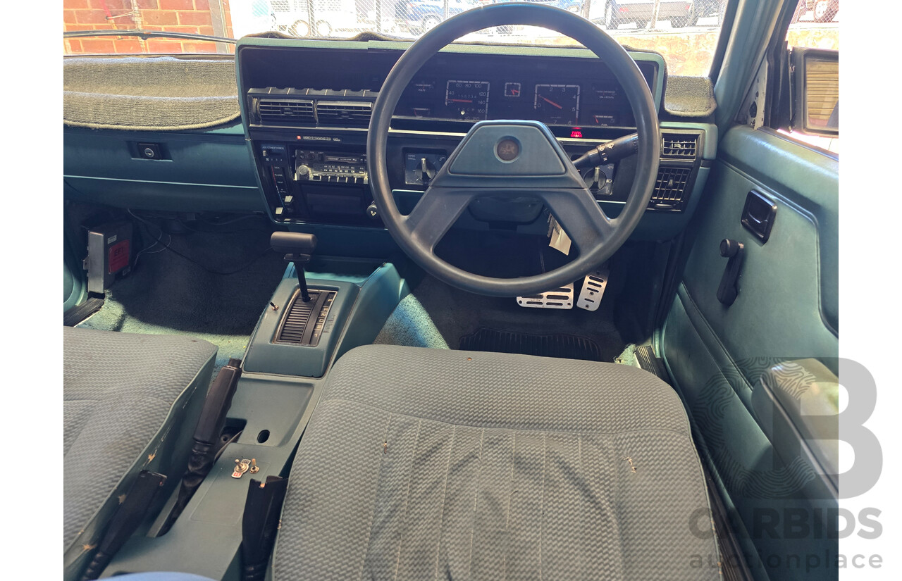 7/1984 Holden VK Commodore SL 4d Sedan Alpine White 3.3L