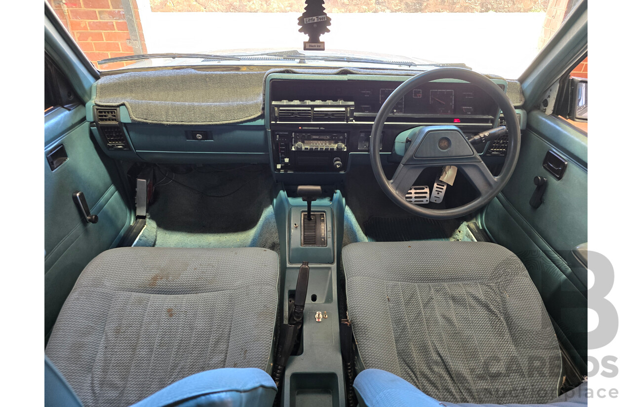 7/1984 Holden VK Commodore SL 4d Sedan Alpine White 3.3L