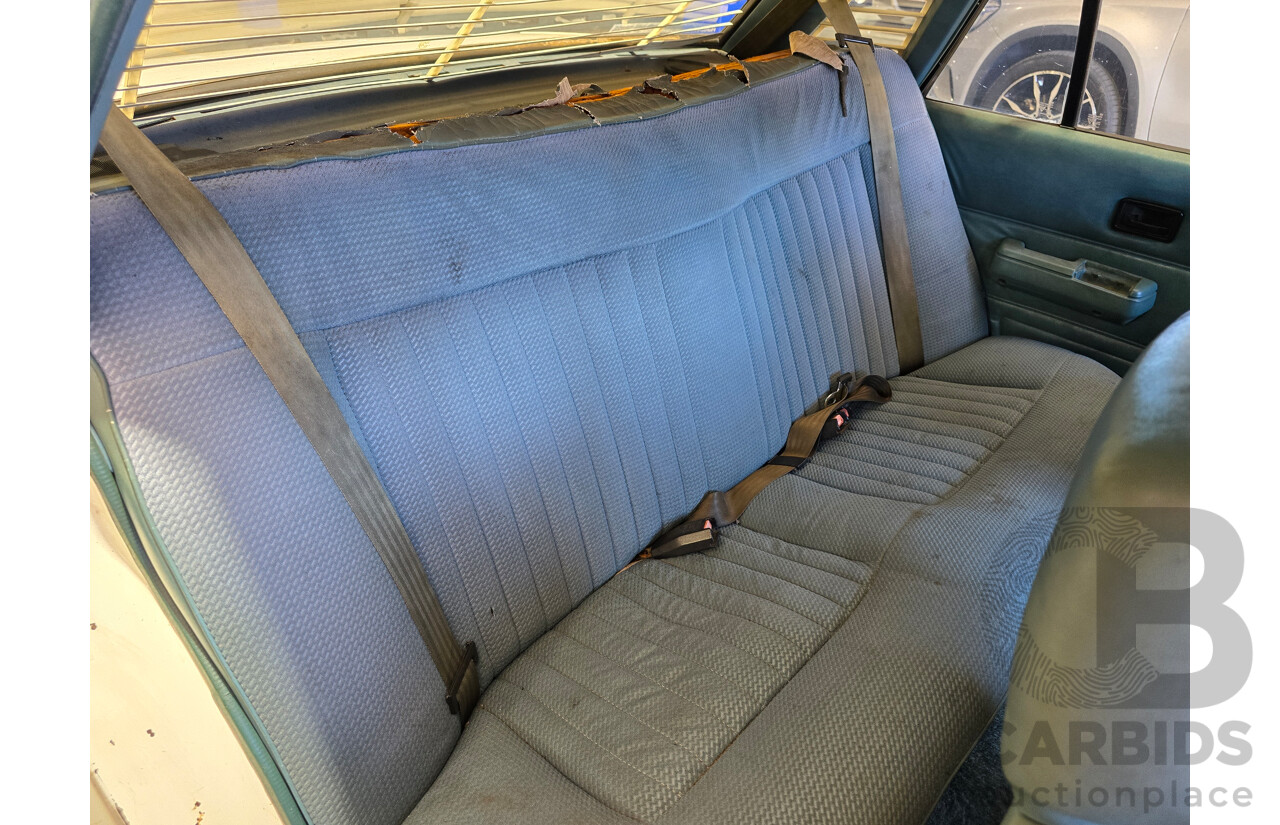 7/1984 Holden VK Commodore SL 4d Sedan Alpine White 3.3L