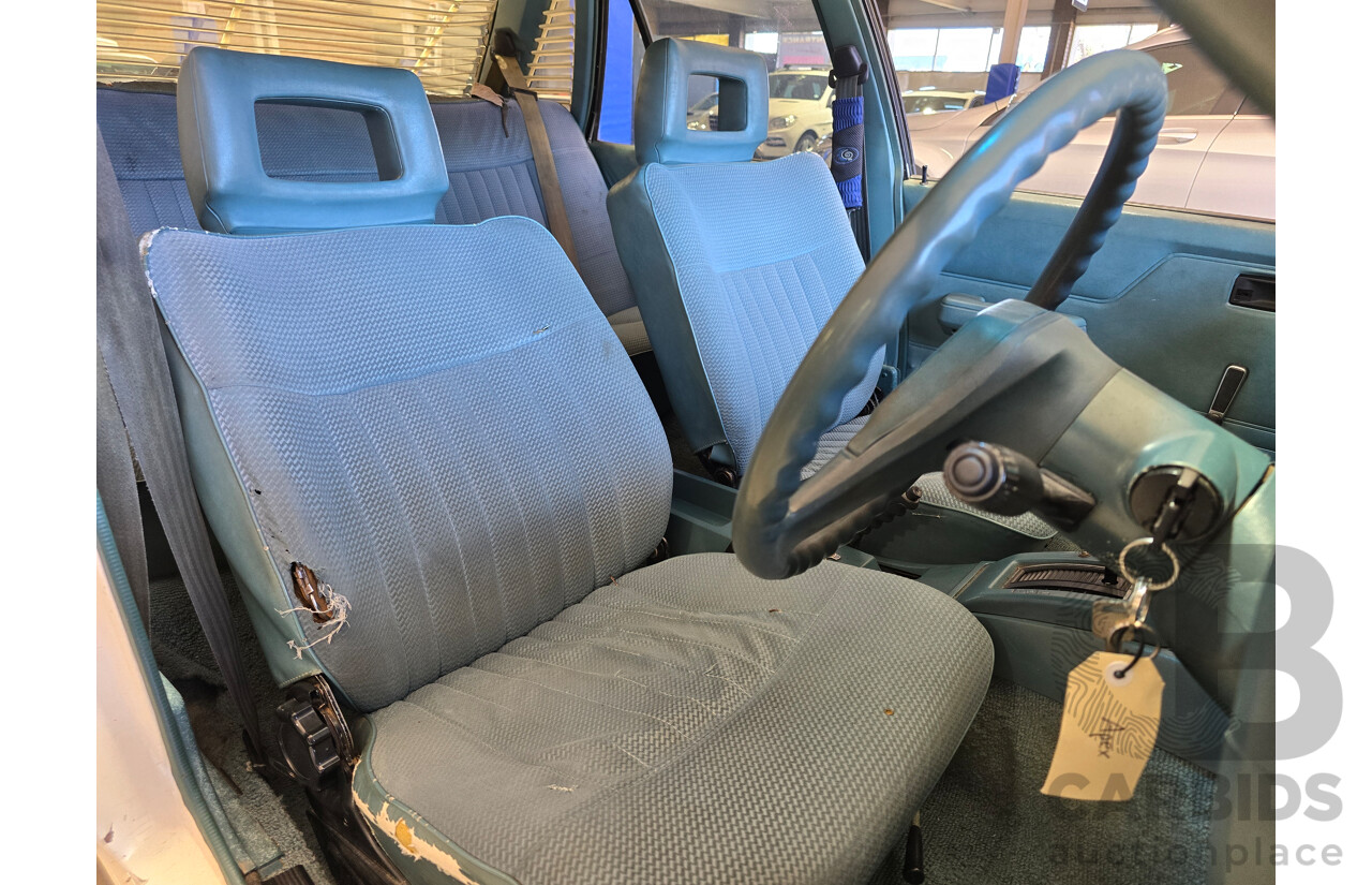 7/1984 Holden VK Commodore SL 4d Sedan Alpine White 3.3L