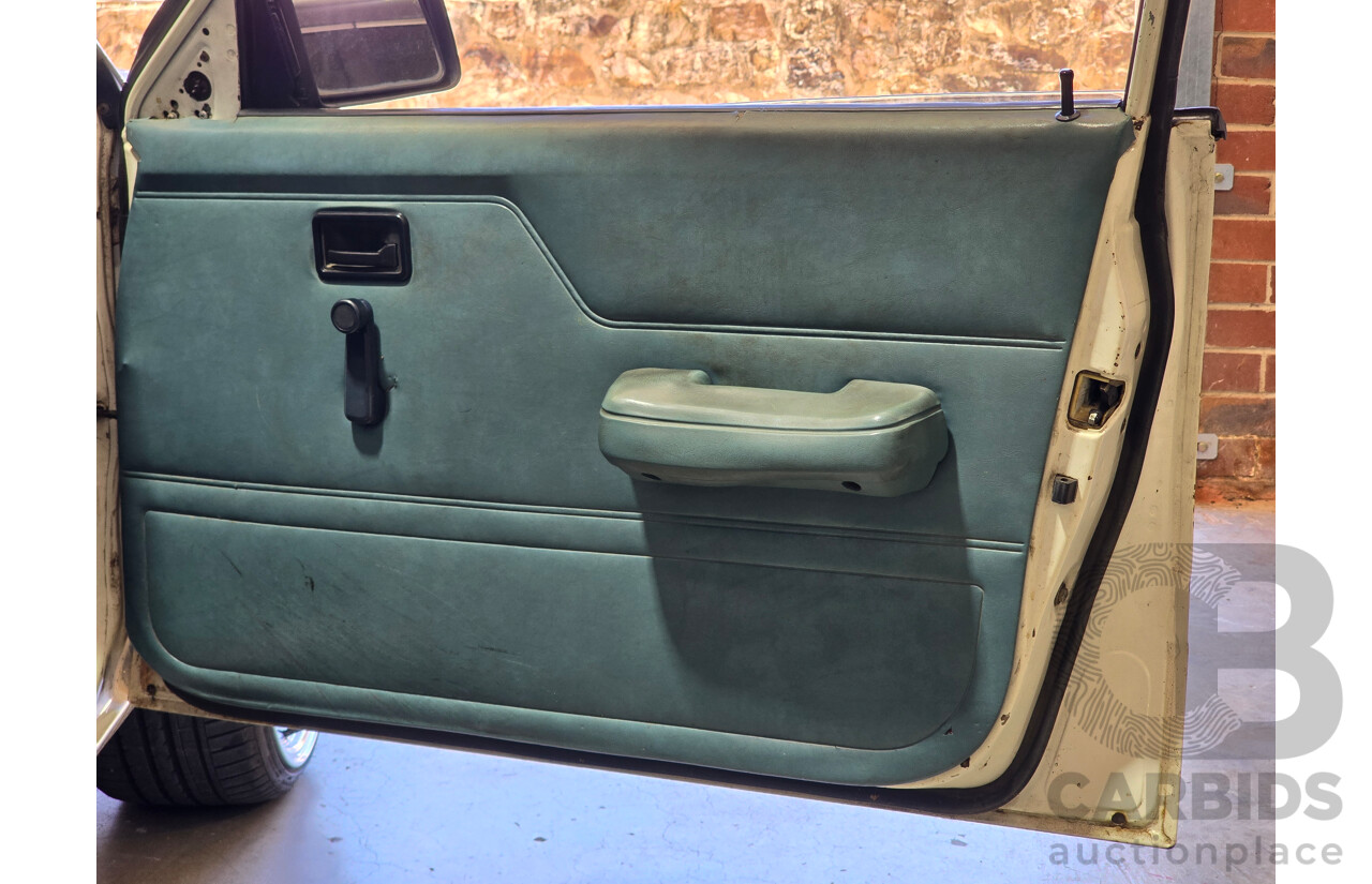 7/1984 Holden VK Commodore SL 4d Sedan Alpine White 3.3L