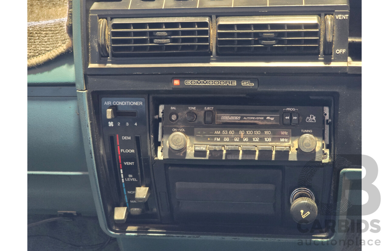 7/1984 Holden VK Commodore SL 4d Sedan Alpine White 3.3L
