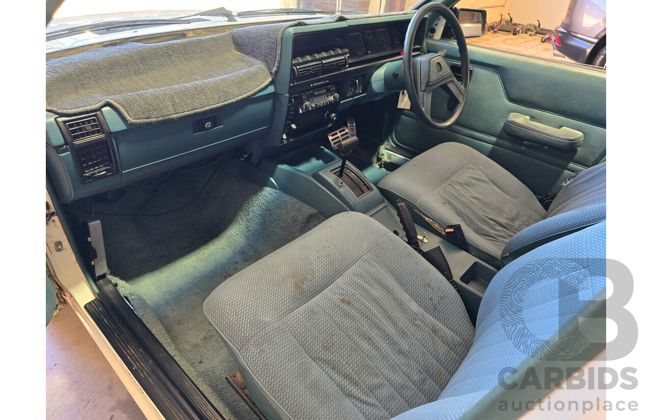7/1984 Holden VK Commodore SL 4d Sedan Alpine White 3.3L