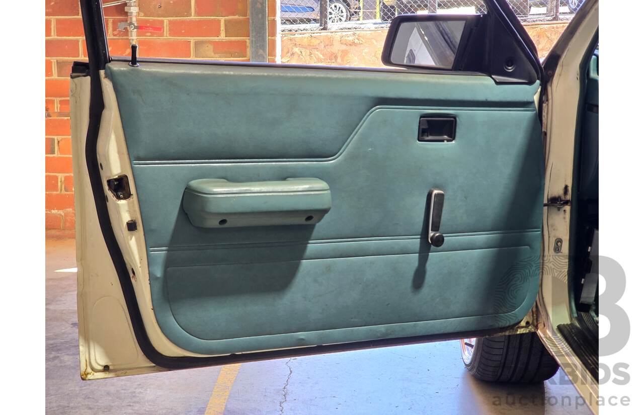 7/1984 Holden VK Commodore SL 4d Sedan Alpine White 3.3L