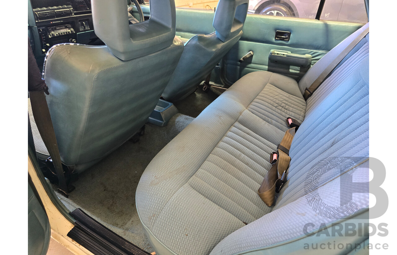 7/1984 Holden VK Commodore SL 4d Sedan Alpine White 3.3L