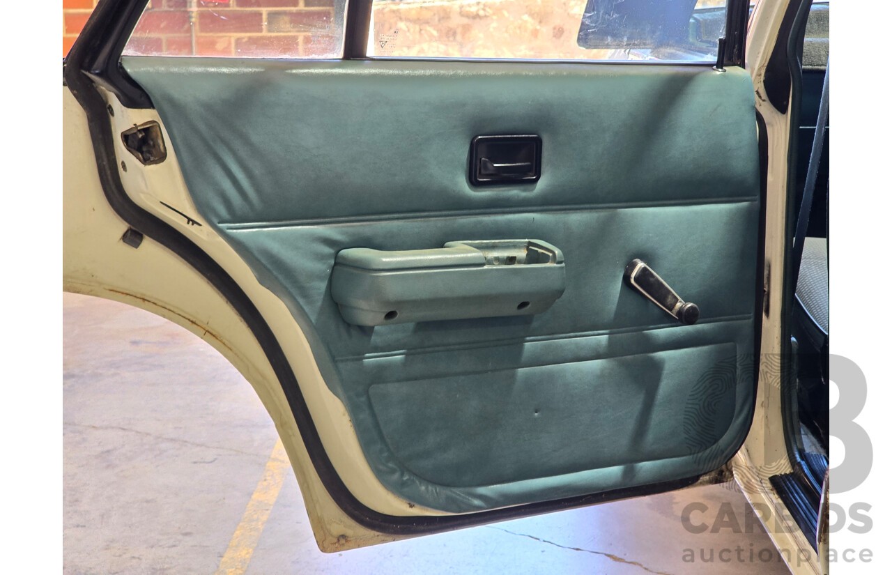 7/1984 Holden VK Commodore SL 4d Sedan Alpine White 3.3L