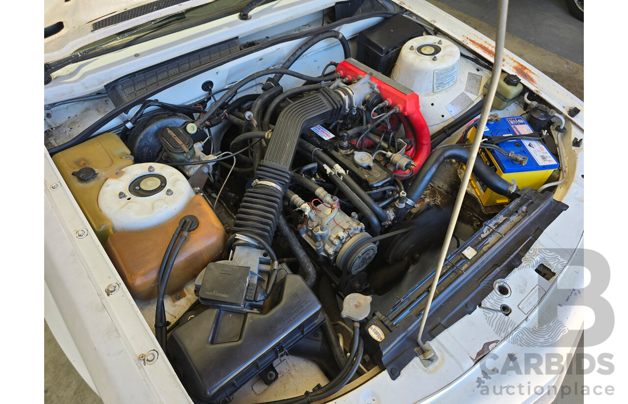 7/1984 Holden VK Commodore SL 4d Sedan Alpine White 3.3L