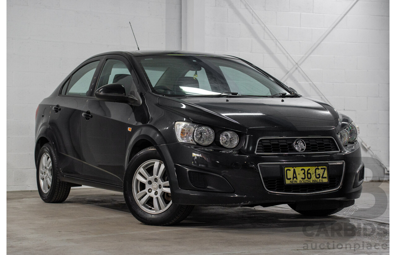 5/2013 Holden Barina CD TM MY13 4d Sedan Carbon Flash Metallic 1.6L