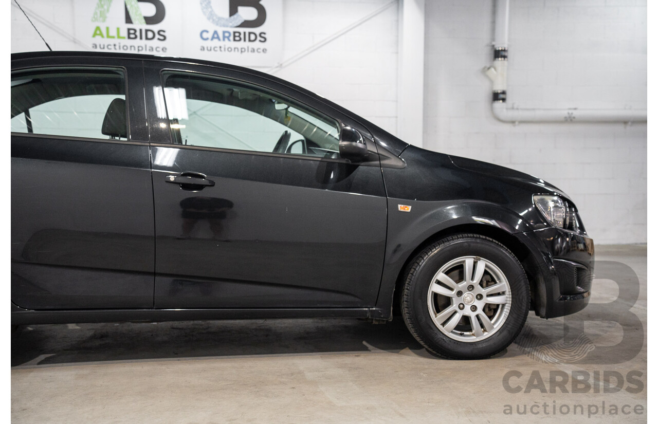 5/2013 Holden Barina CD TM MY13 4d Sedan Carbon Flash Metallic 1.6L