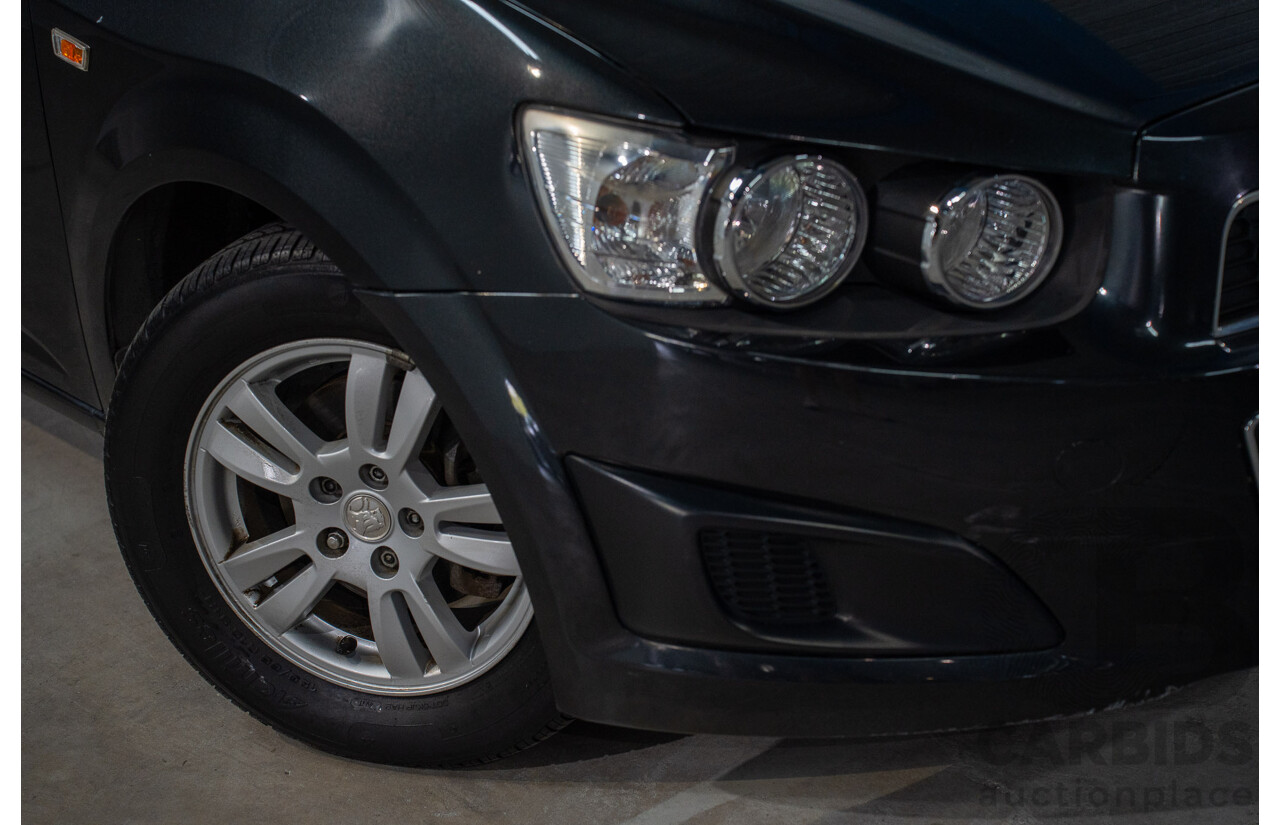 5/2013 Holden Barina CD TM MY13 4d Sedan Carbon Flash Metallic 1.6L