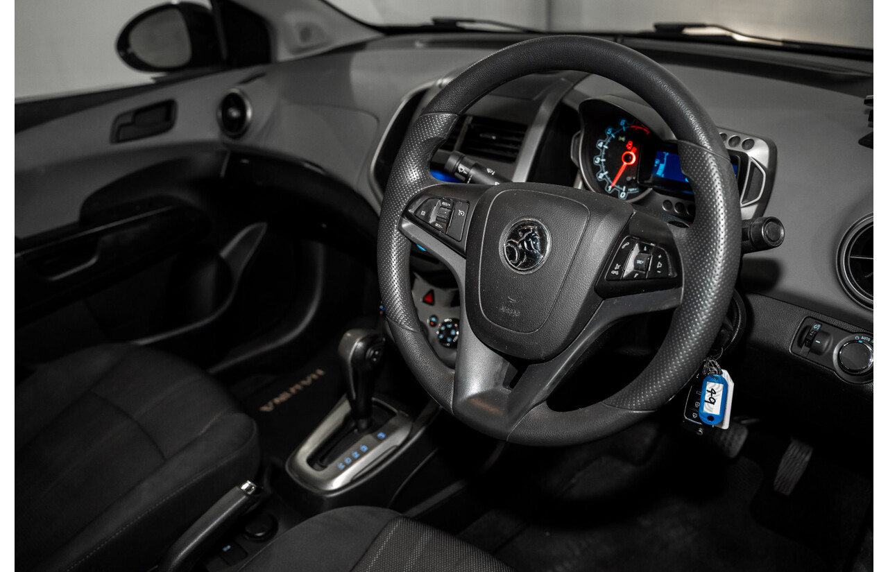 5/2013 Holden Barina CD TM MY13 4d Sedan Carbon Flash Metallic 1.6L