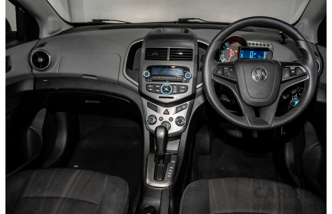 5/2013 Holden Barina CD TM MY13 4d Sedan Carbon Flash Metallic 1.6L