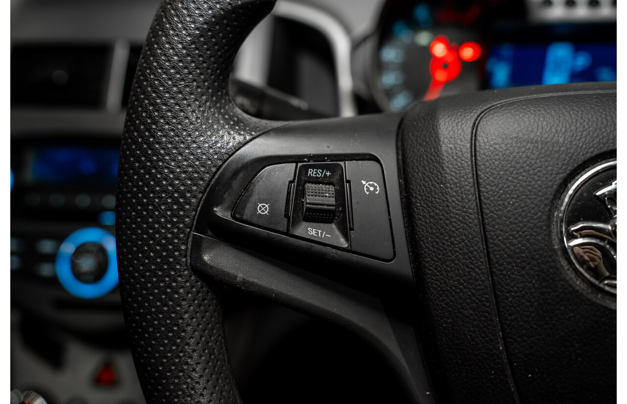 5/2013 Holden Barina CD TM MY13 4d Sedan Carbon Flash Metallic 1.6L