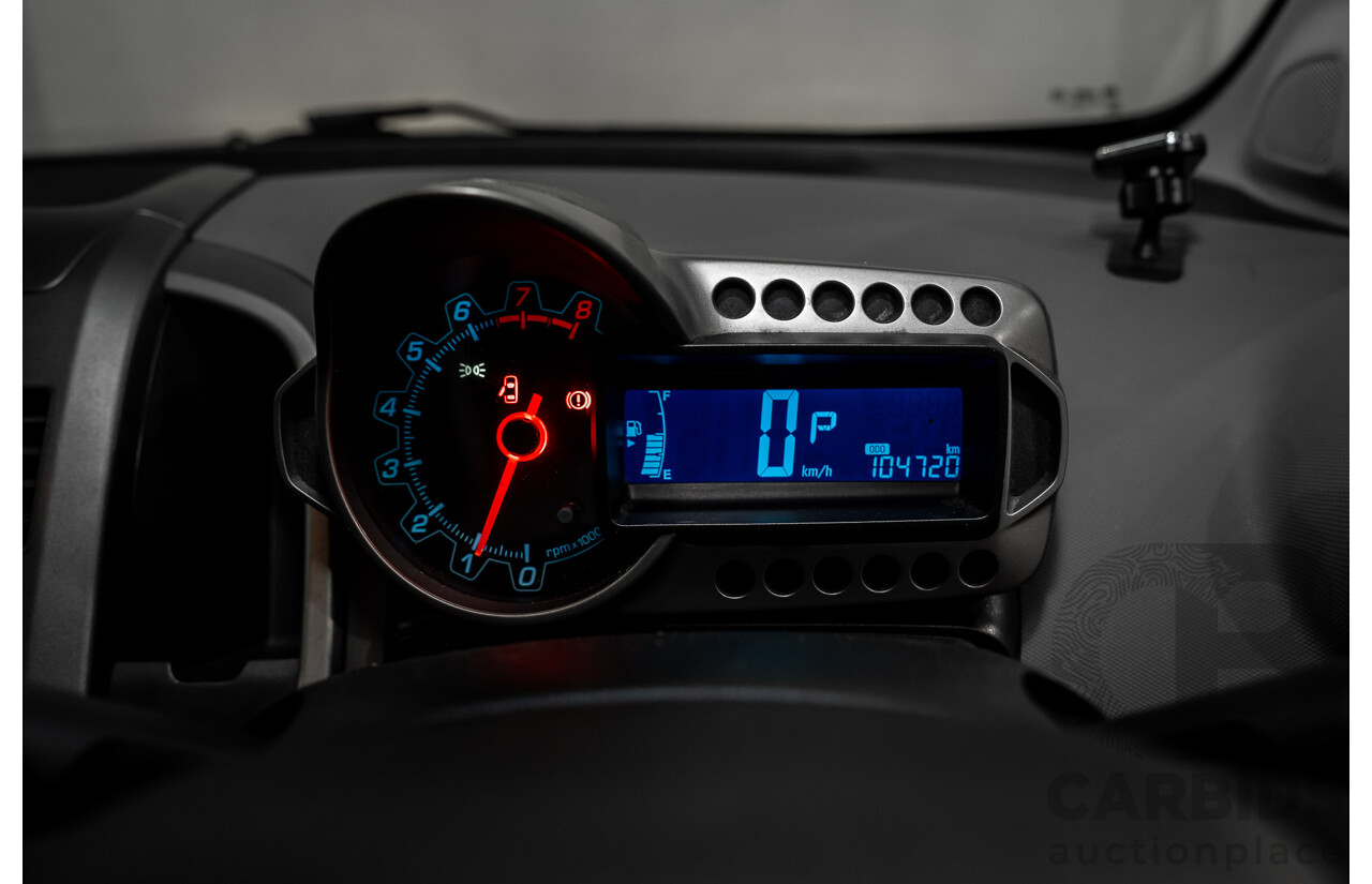 5/2013 Holden Barina CD TM MY13 4d Sedan Carbon Flash Metallic 1.6L