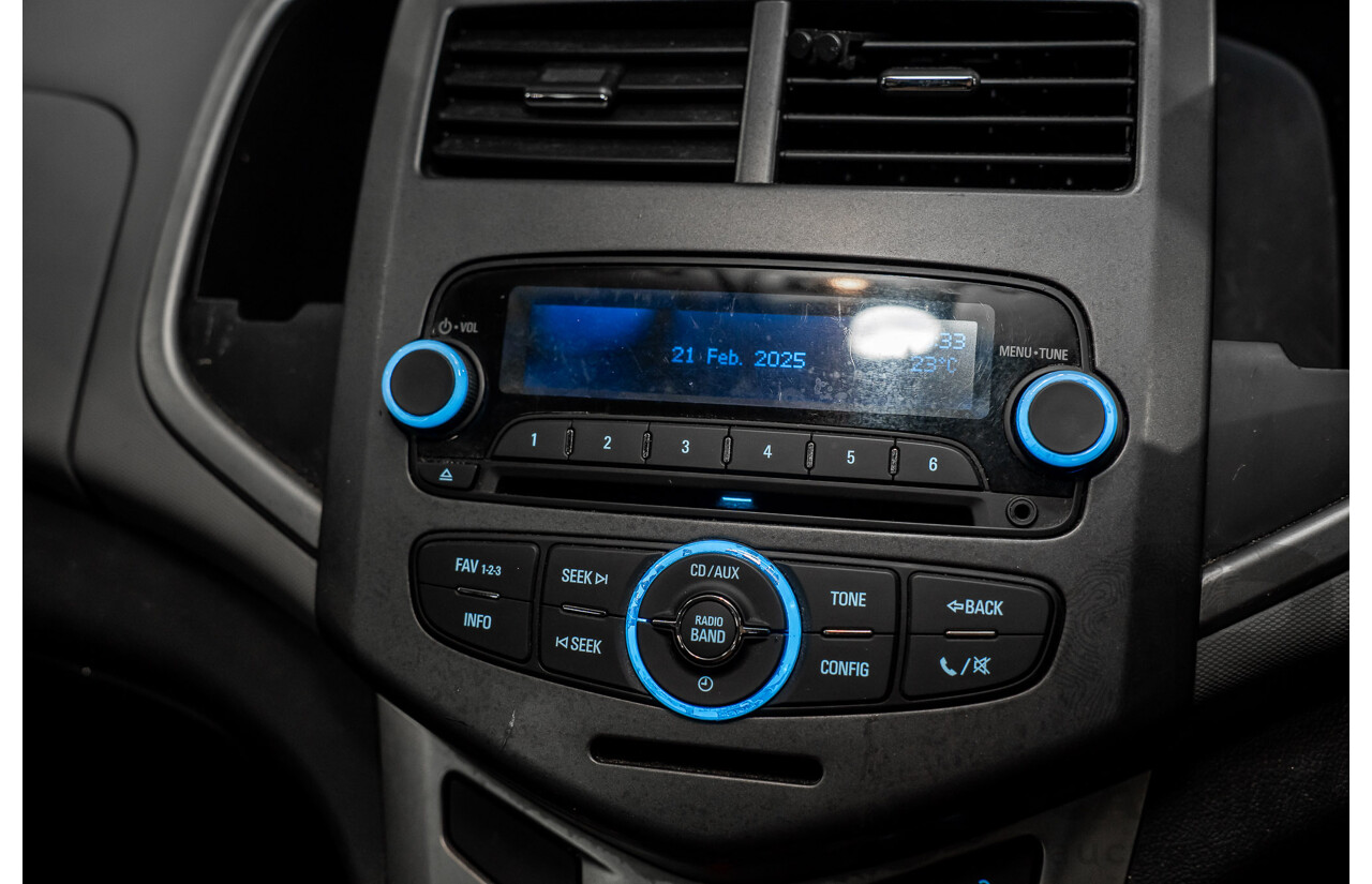 5/2013 Holden Barina CD TM MY13 4d Sedan Carbon Flash Metallic 1.6L