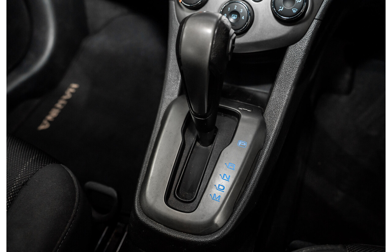 5/2013 Holden Barina CD TM MY13 4d Sedan Carbon Flash Metallic 1.6L