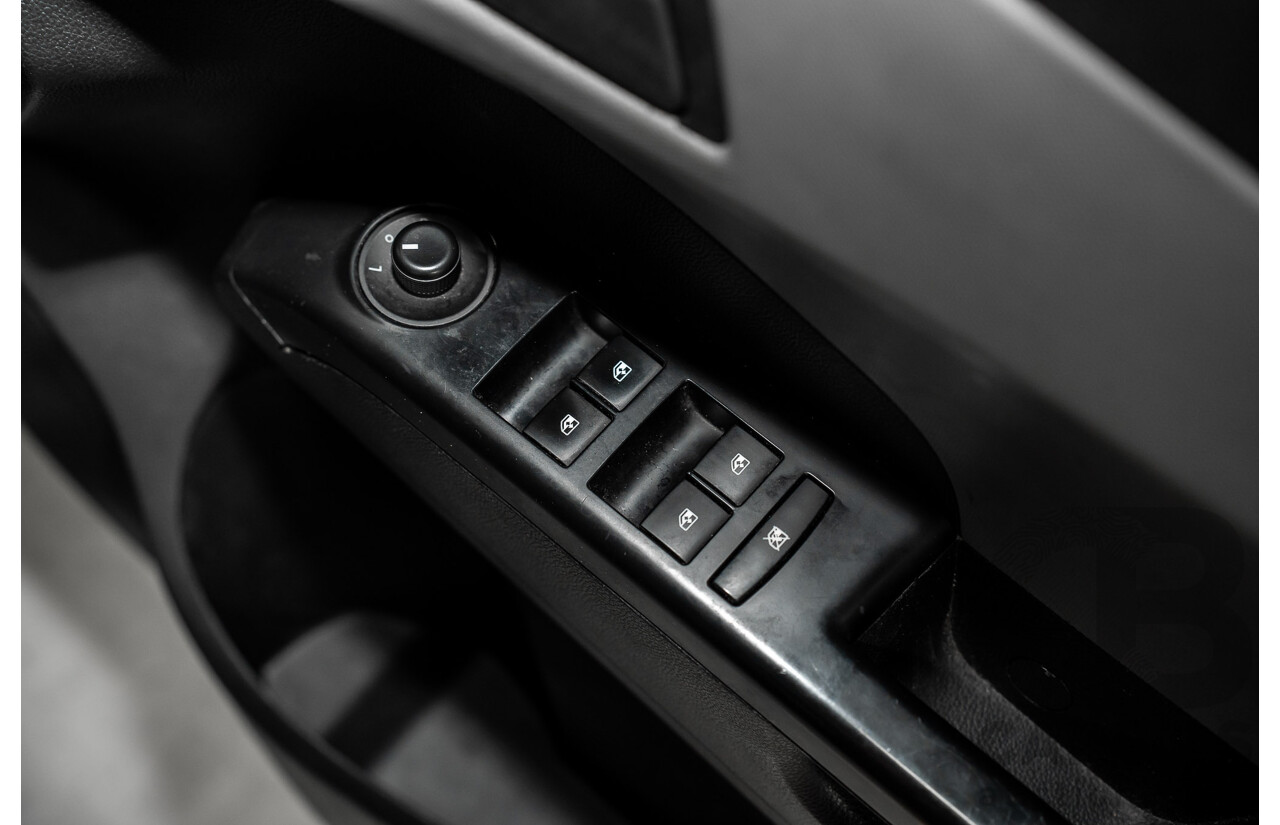 5/2013 Holden Barina CD TM MY13 4d Sedan Carbon Flash Metallic 1.6L