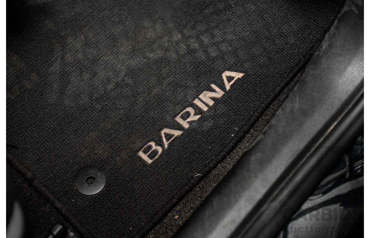 5/2013 Holden Barina CD TM MY13 4d Sedan Carbon Flash Metallic 1.6L