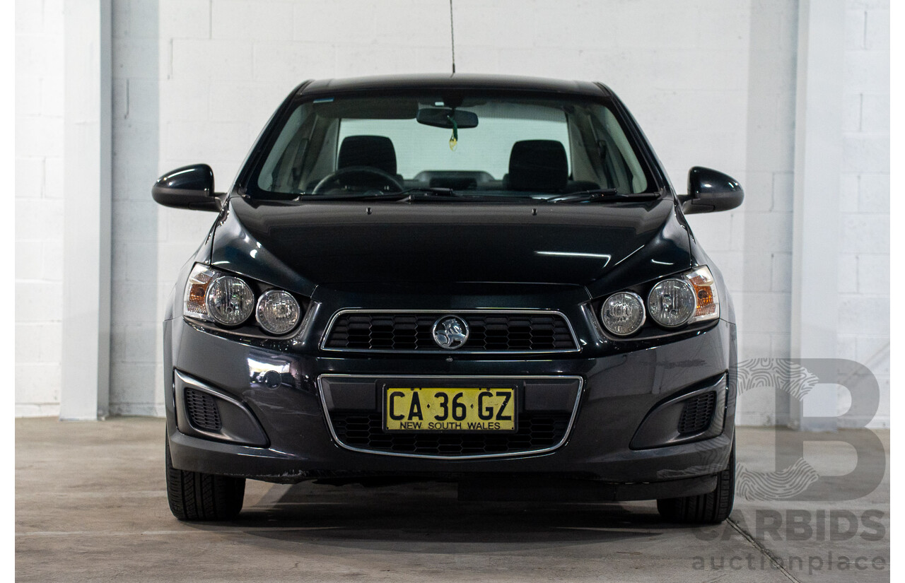 5/2013 Holden Barina CD TM MY13 4d Sedan Carbon Flash Metallic 1.6L