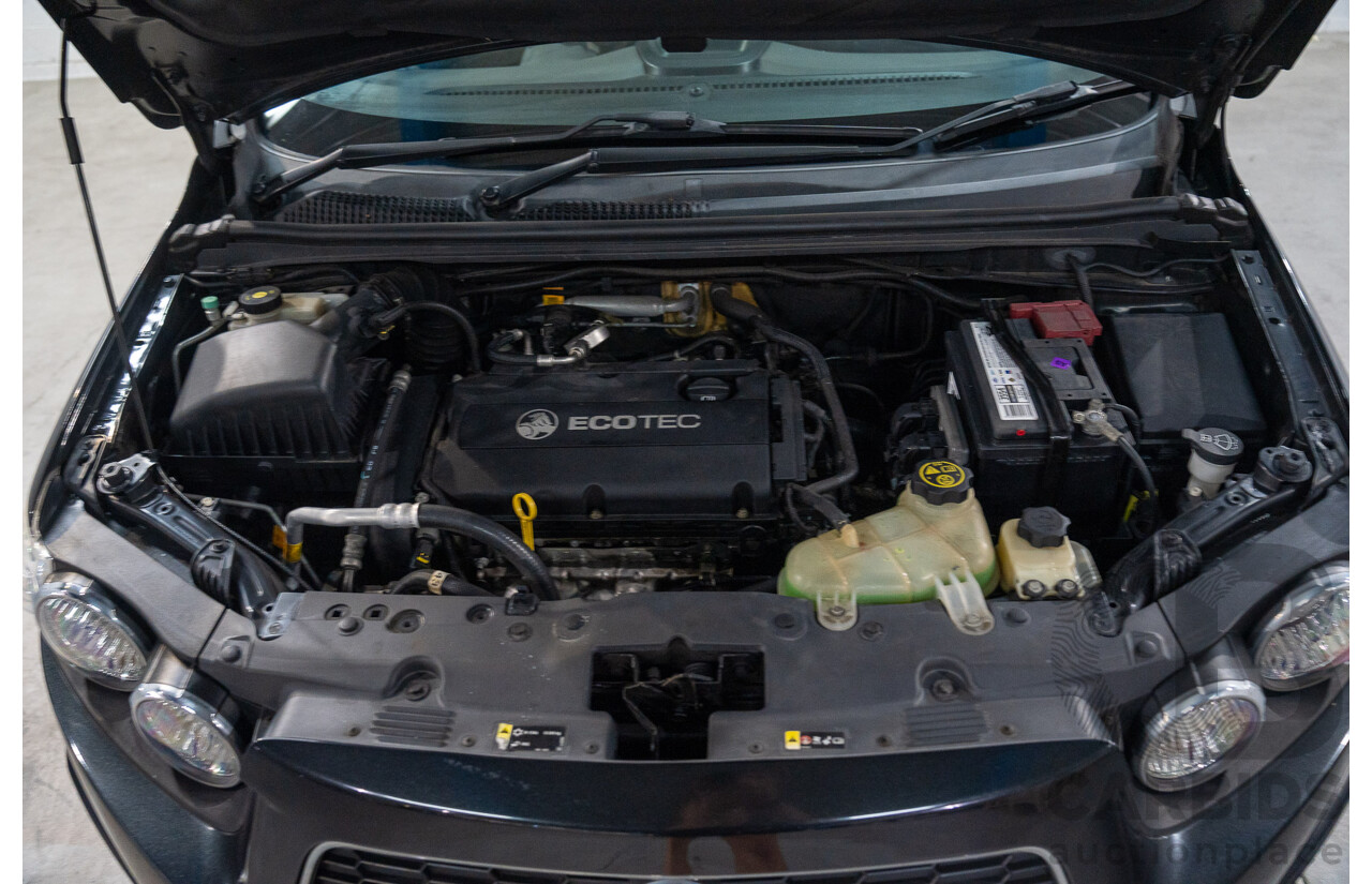 5/2013 Holden Barina CD TM MY13 4d Sedan Carbon Flash Metallic 1.6L