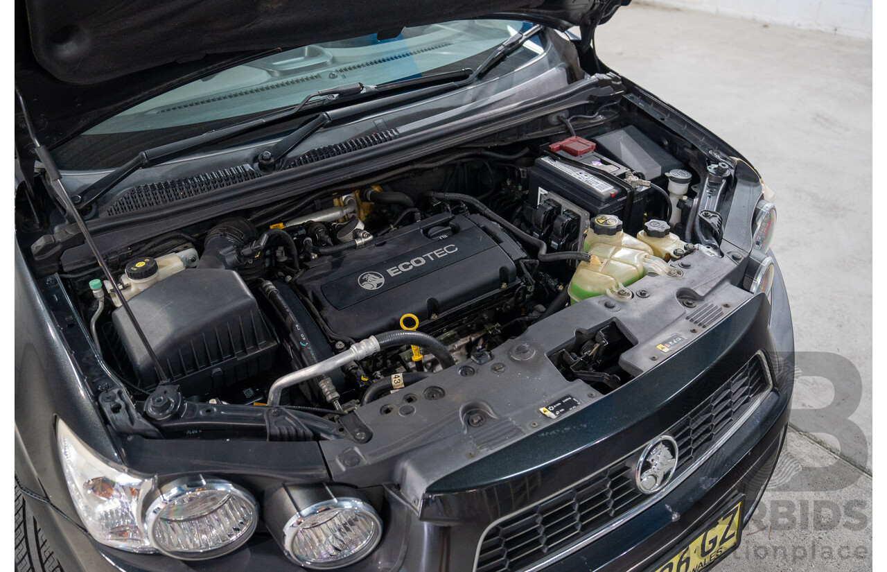 5/2013 Holden Barina CD TM MY13 4d Sedan Carbon Flash Metallic 1.6L