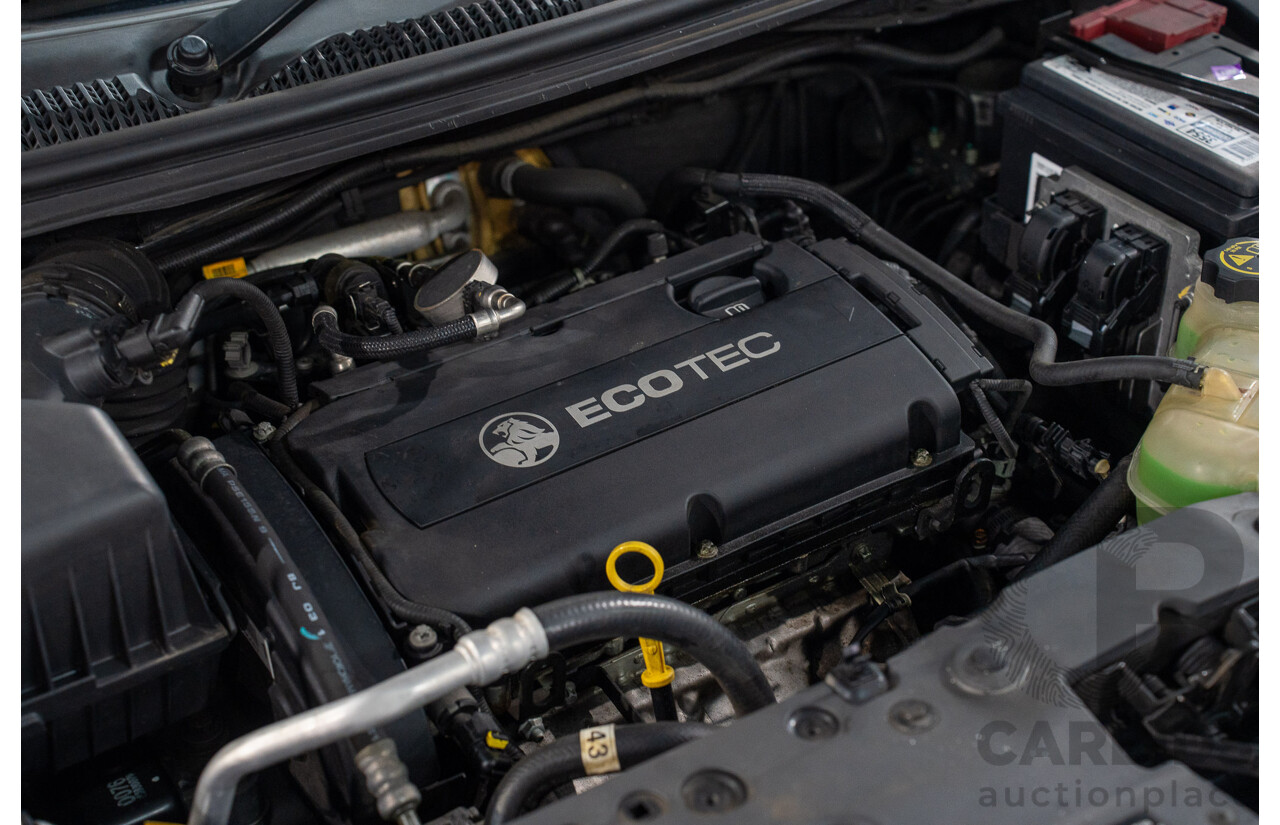 5/2013 Holden Barina CD TM MY13 4d Sedan Carbon Flash Metallic 1.6L