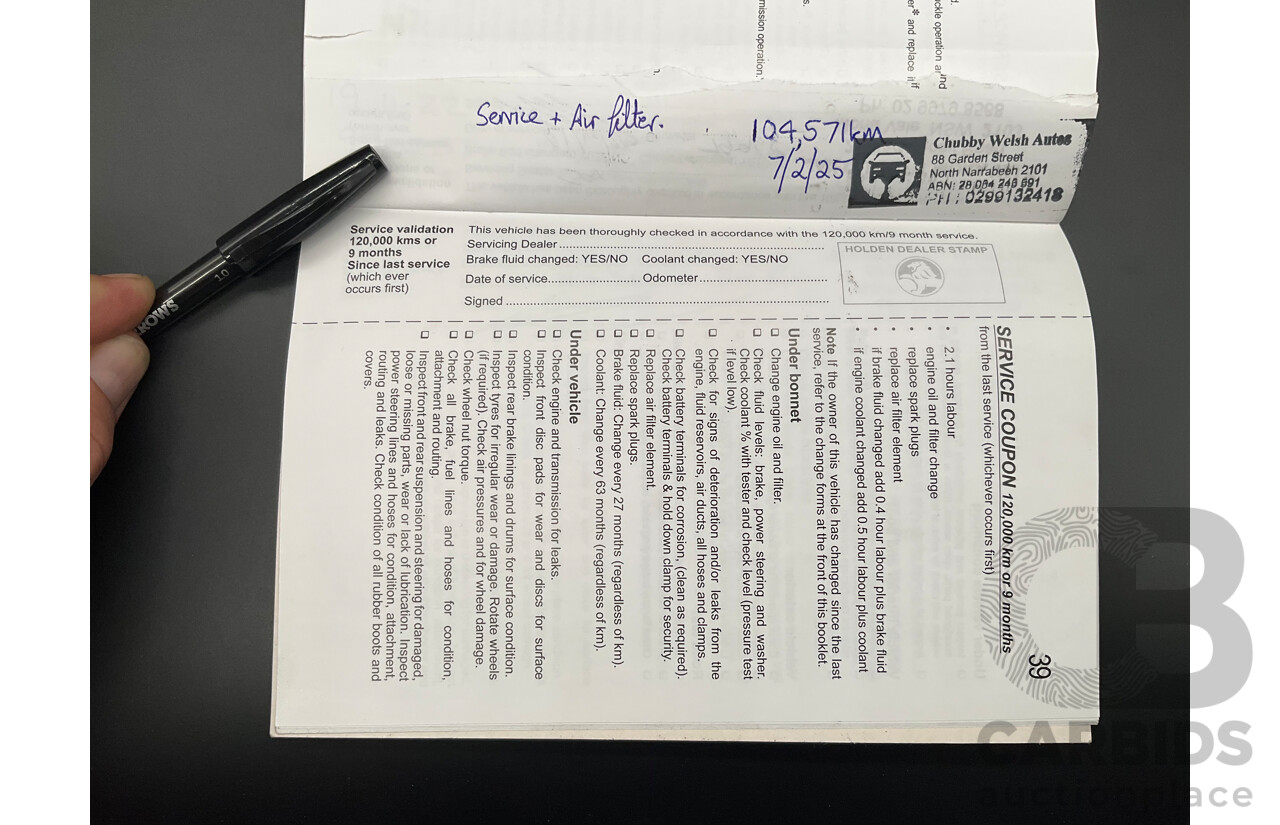 5/2013 Holden Barina CD TM MY13 4d Sedan Carbon Flash Metallic 1.6L