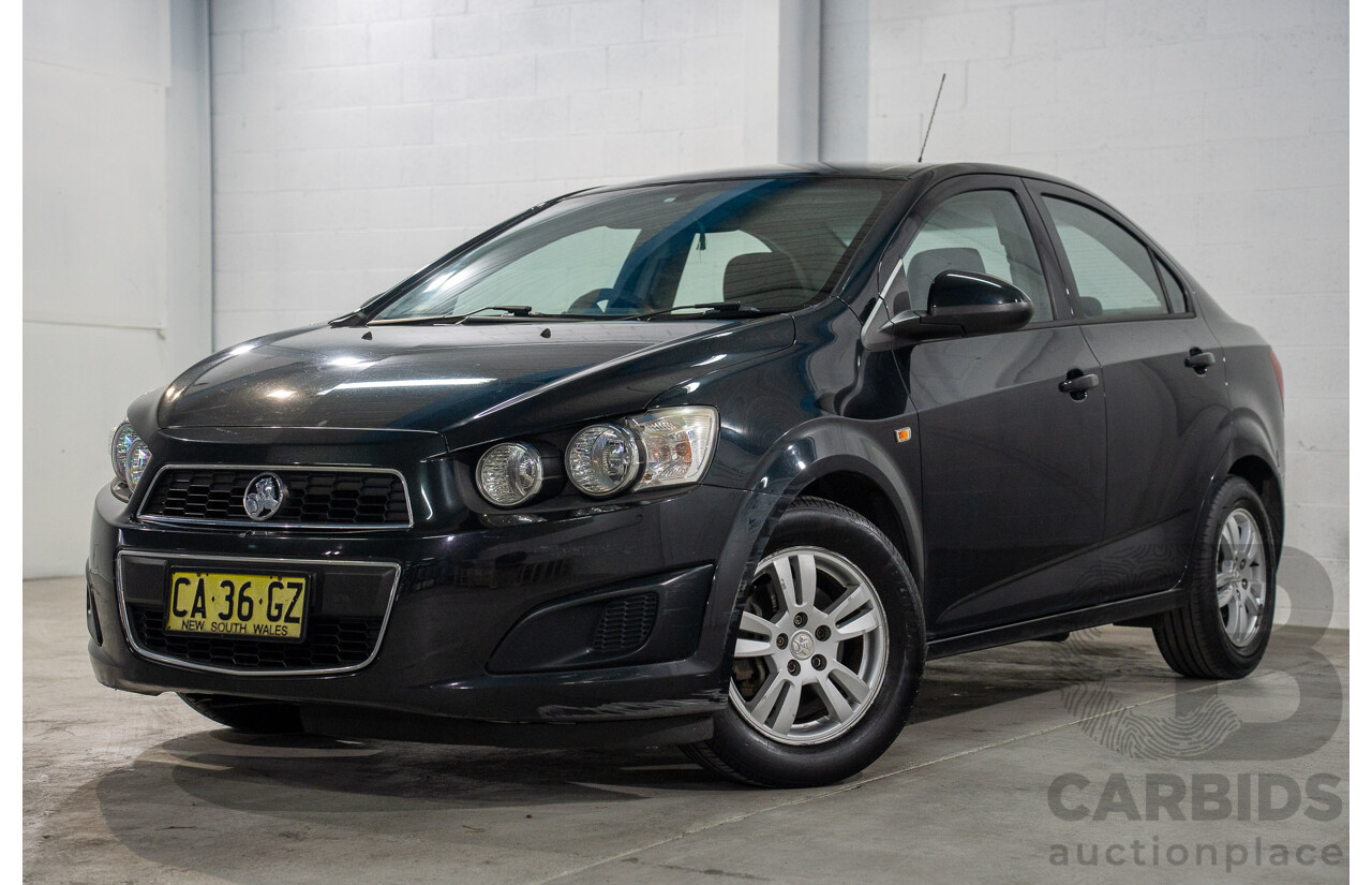5/2013 Holden Barina CD TM MY13 4d Sedan Carbon Flash Metallic 1.6L