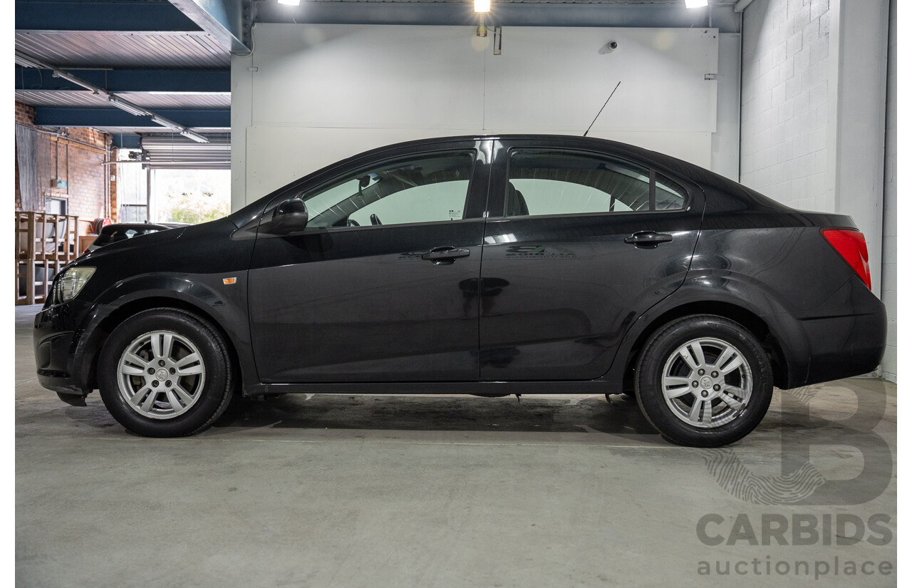 5/2013 Holden Barina CD TM MY13 4d Sedan Carbon Flash Metallic 1.6L