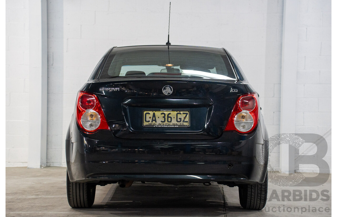 5/2013 Holden Barina CD TM MY13 4d Sedan Carbon Flash Metallic 1.6L