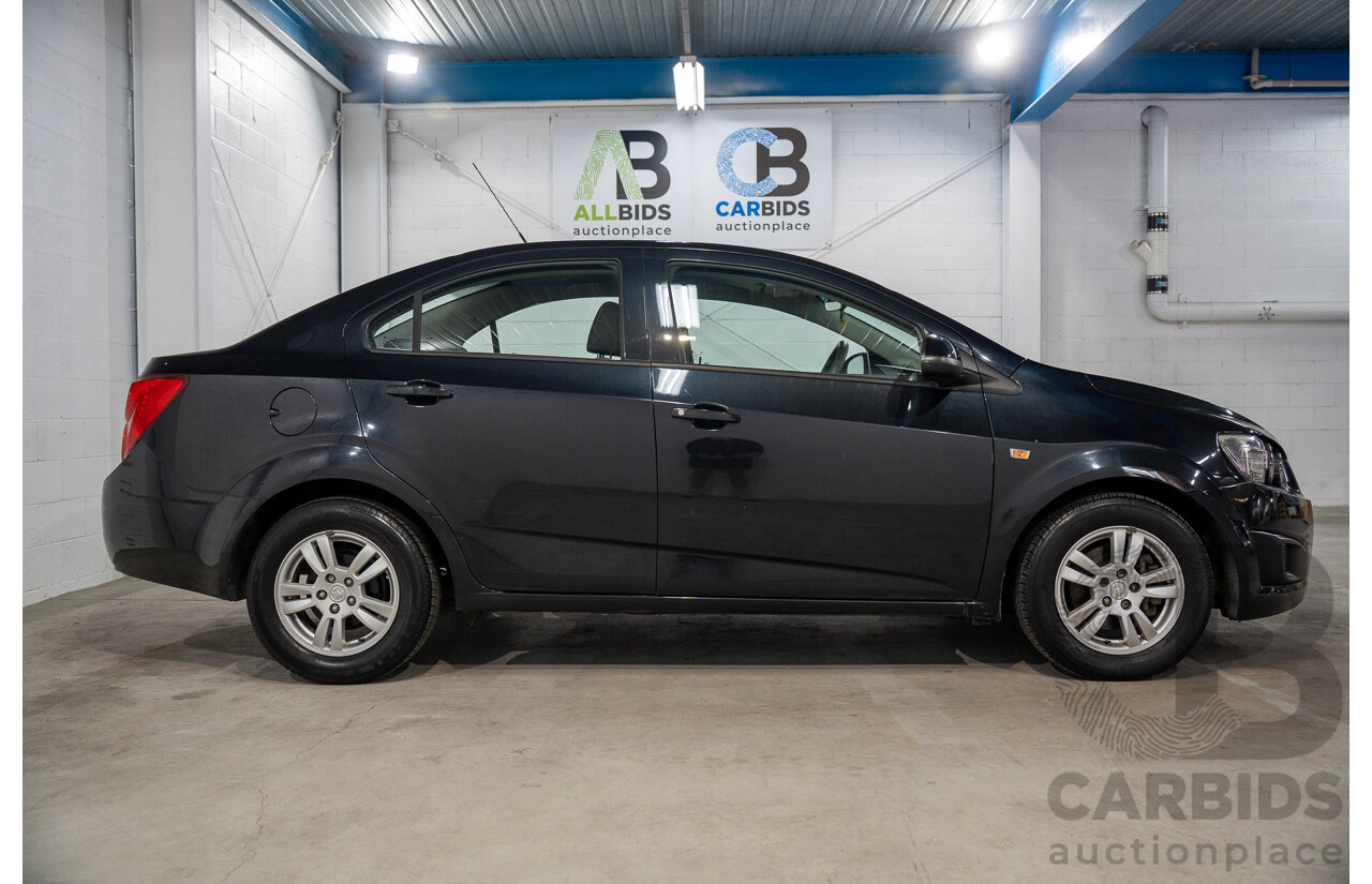 5/2013 Holden Barina CD TM MY13 4d Sedan Carbon Flash Metallic 1.6L