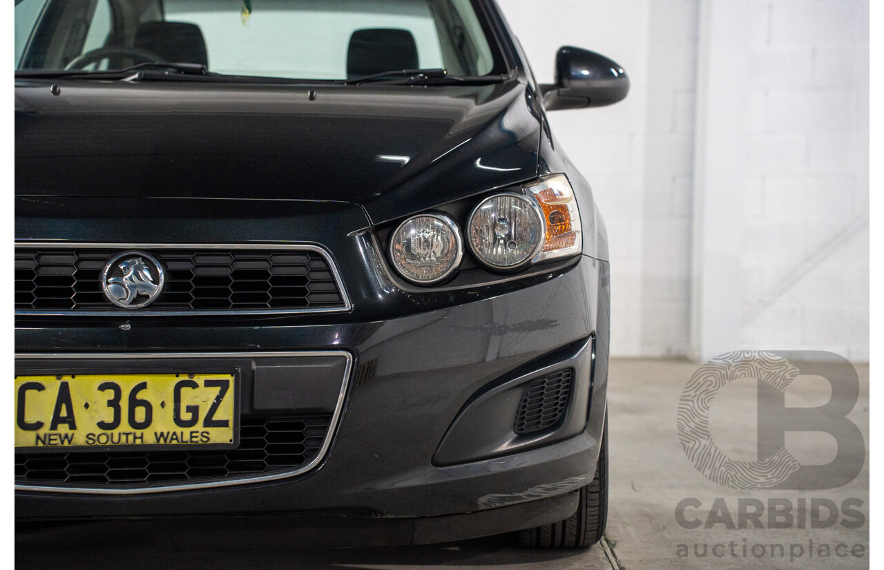 5/2013 Holden Barina CD TM MY13 4d Sedan Carbon Flash Metallic 1.6L