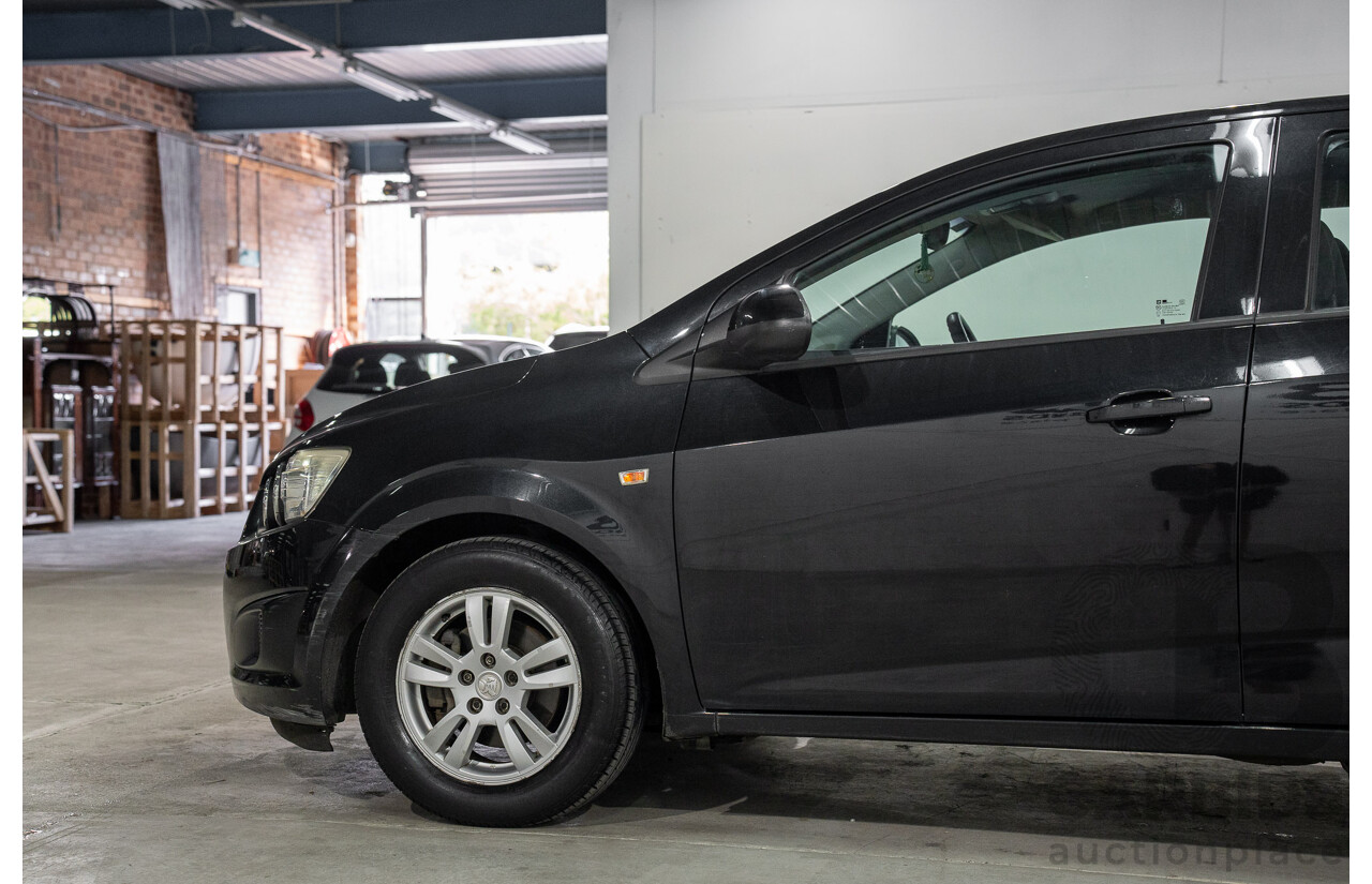 5/2013 Holden Barina CD TM MY13 4d Sedan Carbon Flash Metallic 1.6L