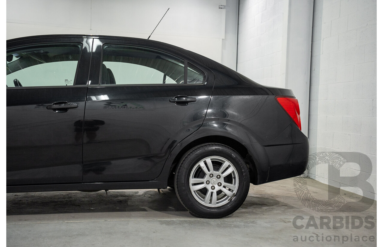 5/2013 Holden Barina CD TM MY13 4d Sedan Carbon Flash Metallic 1.6L